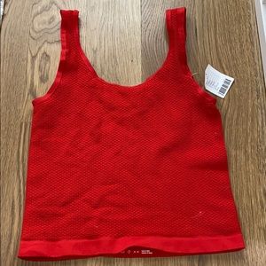 red fishnet tank top
